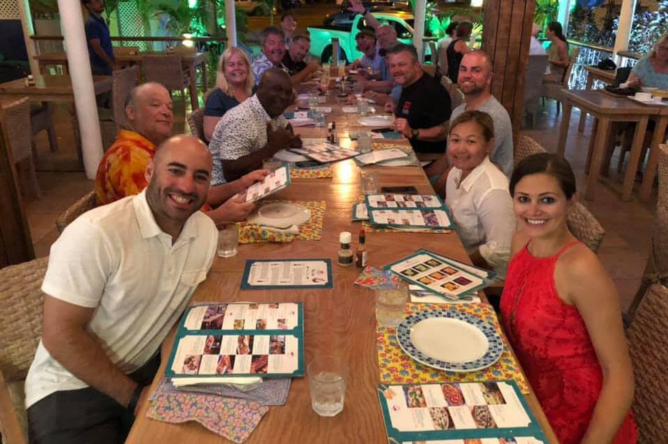 Travelers enjoying a tropical destination on an SXT Adventures trip